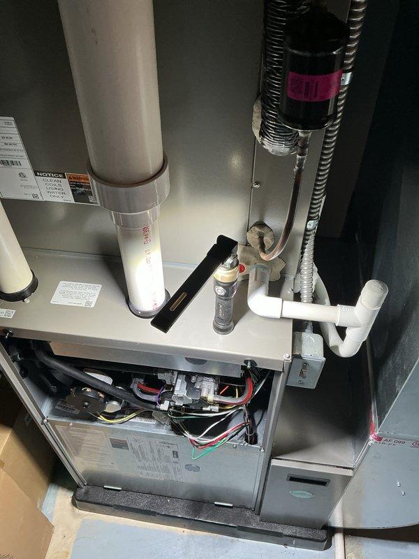 Completed annual heating maintenance tune-up on residential furnace system as part of active air care membership. Performed comprehensive inspection of all HVAC components including blower motor assembly, electrical connections, condensate drainage system, and PVC venting. All systems inspected, tested, and verified operational with no deficiencies noted; unit operating within manufacturer specifications.
