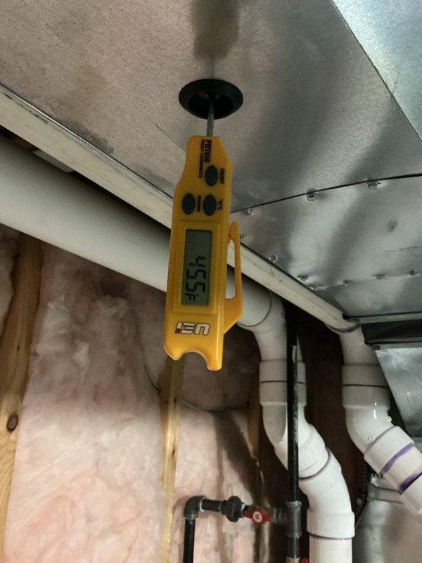 Performed routine maintenance on air conditioning system. Measured supply air temperature at 83.5°F and verified static pressure reading of +5.8 inches water column. Inspected attic-mounted equipment, ductwork, refrigerant lines, and condensate drain system with all components found operating within normal parameters.