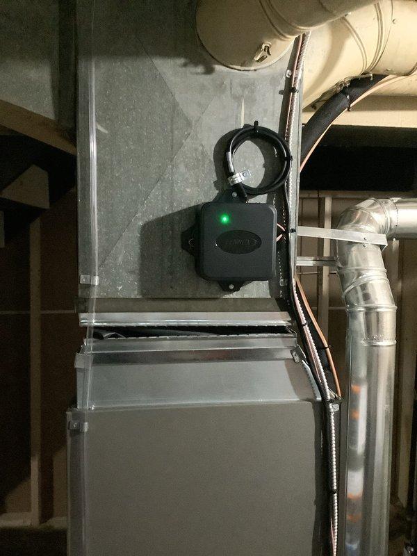 Completed installation of 2-ton evaporator coil and air handler unit in basement utility area, with all ductwork connections properly secured and routed. Reconnected existing condenser unit per customer request, verified refrigerant lines, electrical connections, and condensate drainage system functioning properly. System tested and operational with all mechanical and electrical permits obtained.