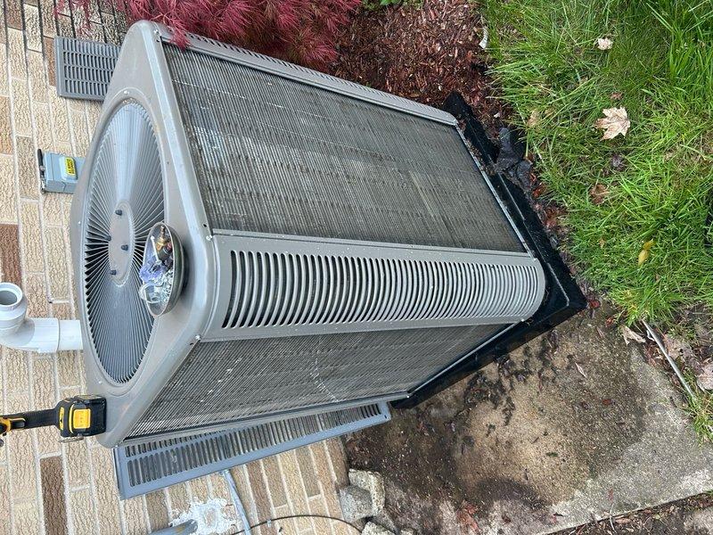 Completed routine Air Care Maintenance on residential outdoor condensing unit. Removed debris and organic matter from top mesh screening and inspected condenser coils through protective grilles. Unit operational with all components intact and functioning properly upon completion of scheduled maintenance visit.