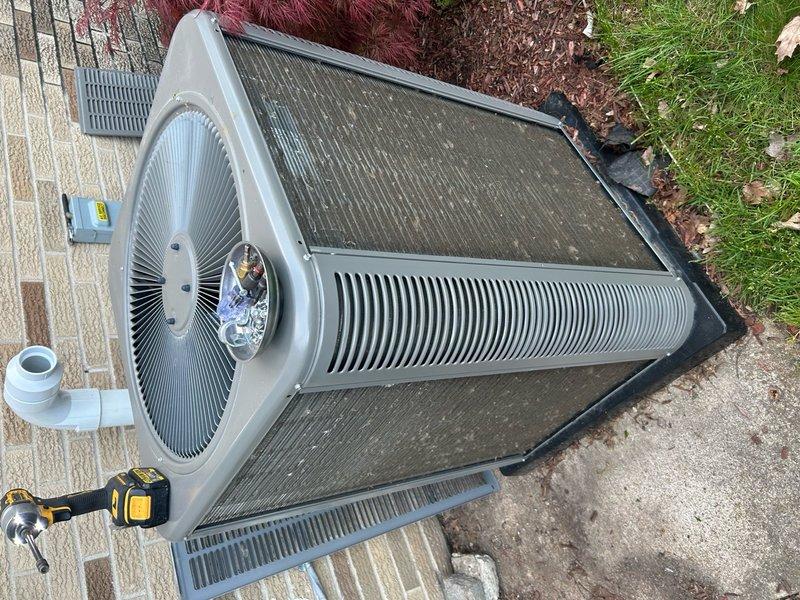 Completed routine Air Care Maintenance on residential outdoor condensing unit. Removed debris and organic matter from top mesh screening and inspected condenser coils through protective grilles. Unit operational with all components intact and functioning properly upon completion of scheduled maintenance visit.