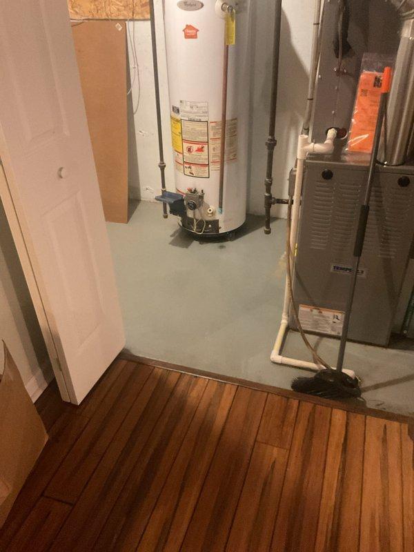 Completed installation of 40-gallon residential tanked water heater in utility room with proper plumbing connections and venting. Mechanical and electrical permits were obtained prior to installation, with reconnection of water supply lines and power completed per code requirements. Unit was tested for proper operation and all safety labels verified in place.