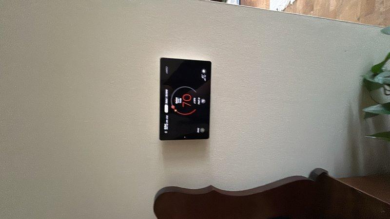 Responded to no communication issue between smart thermostat and hub on 2020 HVAC system located in basement. Attempted reboot procedures without success, performed diagnostic troubleshooting on wireless connectivity and network configuration. Verified thermostat display functionality showing 52°F reading, inspected wall-mounted control panel for proper operation and signal transmission to determine root cause of communication failure.
