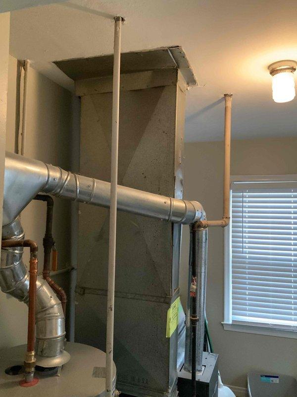 Conducted on-site evaluation for complete central air conditioning system installation at residential property. Assessed existing HVAC infrastructure including furnace, ductwork configuration, electrical service capacity at exterior meter location, and available space in mechanical room for new equipment installation. Provided comprehensive estimate for new AC system with recommendations based on current heating system compatibility and structural requirements.