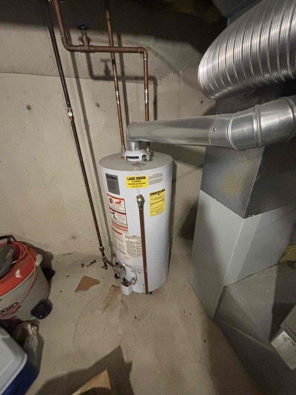 Completed comprehensive site evaluation and estimate preparation for replacement of 30-year-old original 1996 air conditioning system serving 1500 square foot owner-occupied residential condo unit. Assessed existing HVAC equipment configuration in basement mechanical room, including furnace unit, ductwork routing, available installation space, and electrical service compatibility. Documented current system layout with photographic evidence showing beige furnace with black flexible ductwork, metal supply/return duct runs along ceiling joists, water heater positioning, utility sink clearances, and overall equipment accessibility for replacement work. Evaluated structural considerations for new AC unit installation including adequate clearances, proper drainage routing, refrigerant line pathways through existing infrastructure, and condensate management. Confirmed electrical panel capacity and wiring requirements for modern high-efficiency equipment. Measured ductwork dimensions and asses