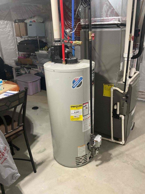 Completed assessment for water heater replacement in basement mechanical room. Existing 11-year-old water heater is non-operational and requires full replacement. Evaluated installation area containing natural gas furnace with adjacent water heater, noting existing PEX plumbing connections (hot and cold supply lines), gas line access, and proper venting requirements. Documented current equipment configuration including connection points, clearance specifications, and mechanical room layout. Provided comprehensive estimate for new water heater installation including removal and disposal of failed unit, installation of replacement water heater with code-compliant connections, pressure relief valve, expansion tank if required, and all necessary supply line modifications to ensure proper integration with existing plumbing system.
