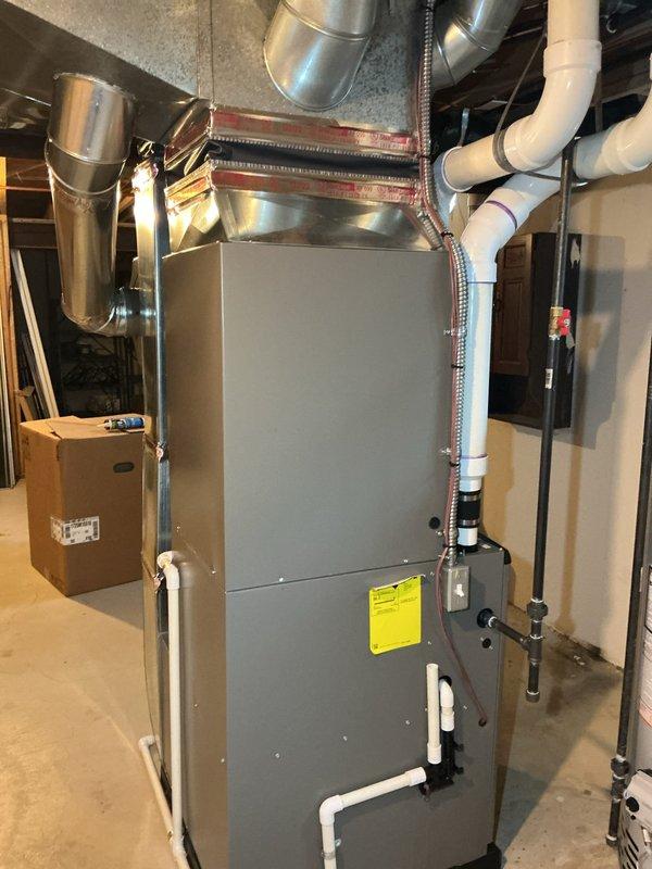 Replaced evaporator coil model CX35-48C-6F29A26 on Lennox HVAC system under full warranty coverage per purchase order #1271940-001. Installation completed in basement mechanical room with all ductwork reconnected and system restored to proper operation.