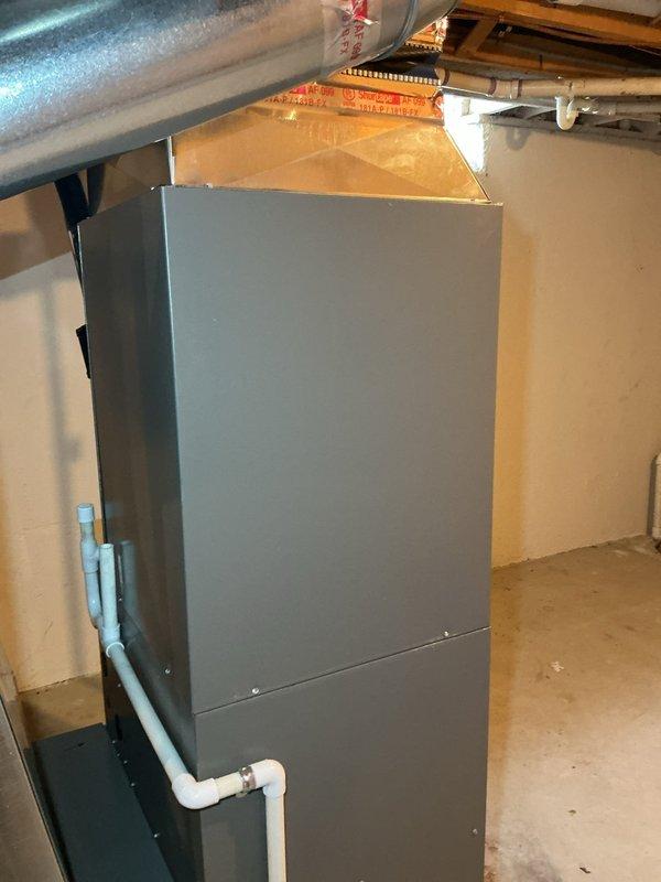 Replaced evaporator coil model CX35-48C-6F29A26 on Lennox HVAC system under full warranty coverage per purchase order #1271940-001. Installation completed in basement mechanical room with all ductwork reconnected and system restored to proper operation.