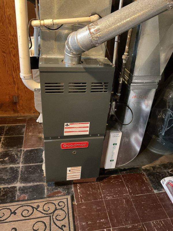 Completed annual maintenance tune-up on residential Goodman forced air furnace and air conditioning system. Performed comprehensive inspection of gas furnace including heat exchanger, burner assembly, blower motor, and all electrical connections; verified proper operation of all components with no issues identified. Conducted AC system tune-up with both heating and cooling systems found to be operating within normal parameters at time of service.