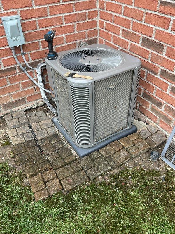 Completed annual cooling maintenance on residential air conditioning system. Performed comprehensive inspection of outdoor condensing unit, including cleaning of condenser coils, verification of refrigerant levels, testing of electrical connections, and assessment of overall system operation. Replaced humidifier pad as part of scheduled maintenance protocol.