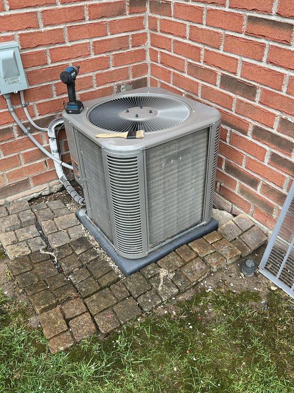 Completed annual cooling maintenance on residential air conditioning system. Performed comprehensive inspection of outdoor condensing unit, including cleaning of condenser coils, verification of refrigerant levels, testing of electrical connections, and assessment of overall system operation. Replaced humidifier pad as part of scheduled maintenance protocol.