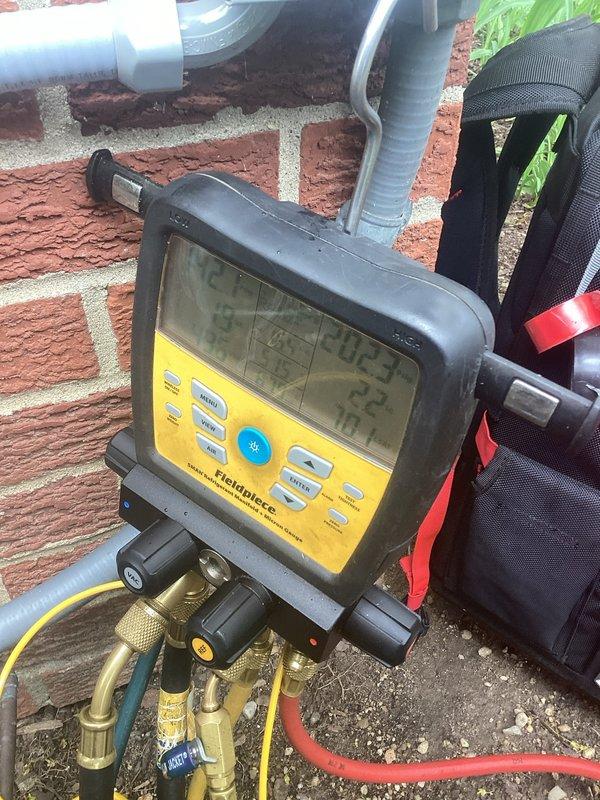 Completed comprehensive preventative maintenance tune-up on residential Lennox air conditioning system. Performed system diagnostics using Fieldpiece digital manifold gauges to verify refrigerant pressures and temperatures, inspected outdoor condenser unit for proper operation, and documented equipment condition with photos. Unit operating within normal parameters with no issues identified during inspection.