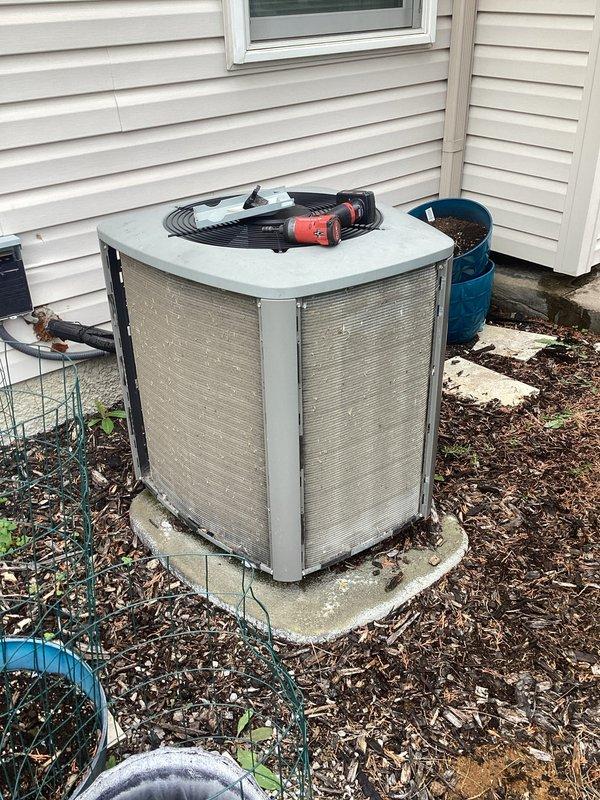 Completed annual cooling maintenance on residential AC system. Identified and addressed humidifier pad replacement need during inspection. Performed standard ACM protocol including filter assessment, system evaluation, and equipment servicing on outdoor condensing unit.
