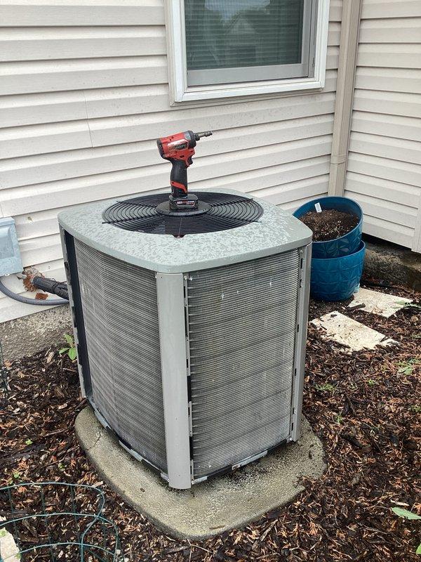 Completed annual cooling maintenance on residential AC system. Identified and addressed humidifier pad replacement need during inspection. Performed standard ACM protocol including filter assessment, system evaluation, and equipment servicing on outdoor condensing unit.