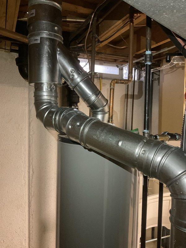 Completed full HVAC system installation including a 70,000 BTU furnace and 2-ton air conditioning unit with rear discharge configuration. Installed new ductwork with proper connections and secure mounting, reconnected all electrical and control wiring, and positioned equipment on platform in mechanical room. Obtained mechanical and electrical permits prior to installation, processed Michigan Saves financing documentation, and coordinated utility rebate applications with DTE and Consumers Energy.