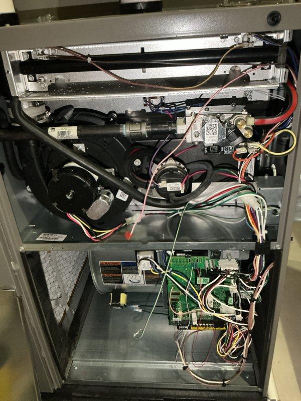 Completed comprehensive Air Care Heating and Cooling recurring maintenance service on residential HVAC system. Performed full system inspection with access panel removal, documenting all internal components including blower motor assembly, gas valve controls, heat exchanger, circuit control boards, electrical connections, and safety systems. All components photographed and verified to be in proper working condition with no issues identified during this scheduled maintenance visit.