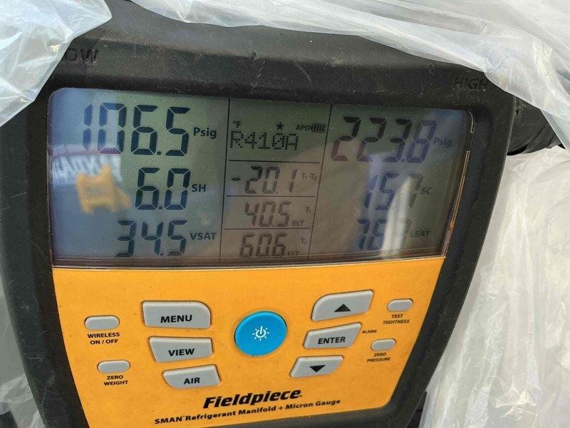 Completed routine preventive maintenance on a six-year-old central air conditioning system during an afternoon appointment. Performed comprehensive system inspection using digital refrigerant manifold and micron gauge, recording operating pressures, superheat, and saturation temperatures to verify proper refrigerant charge and system performance. Noted significant dirt and debris accumulation on outdoor condenser coil requiring attention. All system parameters measured within acceptable operating ranges with no operational deficiencies identified at time of service.