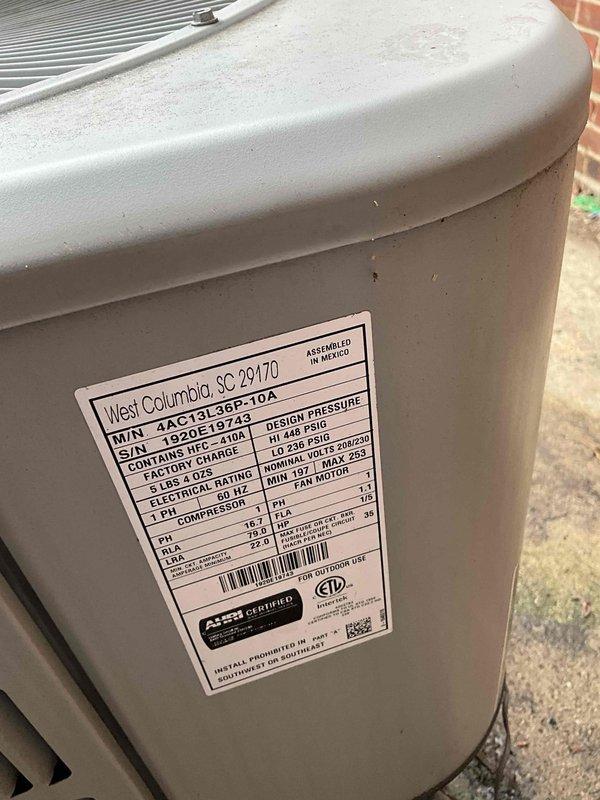 Provided full system replacement estimate for aging HVAC system with critically low refrigerant in outdoor condensing unit. Assessed 6-year-old Goodman 3-ton AC unit (Model 4AC13L36P-10A) showing significant refrigerant loss, 10+ year-old evaporator coil, and approximately 10-year-old forced-air furnace with existing ductwork in basement installation. Recommended complete system replacement rather than repair due to age of components and cost-effectiveness of new equipment installation.