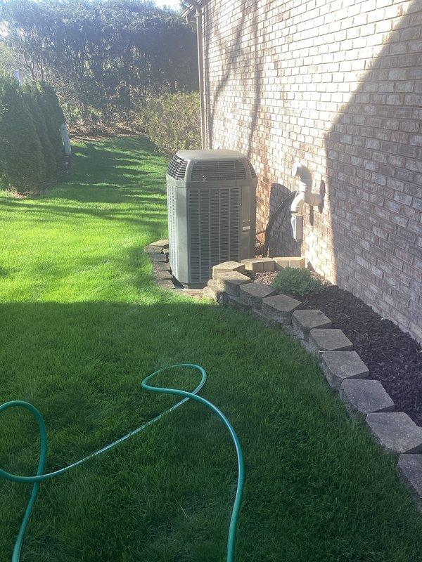 Completed comprehensive tune-up on 13-year-old residential air conditioning system. Performed full system diagnostics using refrigerant manifold gauges to verify operating pressures and temperatures, inspected condensing unit exterior components, and confirmed proper system performance. All measurements recorded within acceptable parameters for continued operation.
