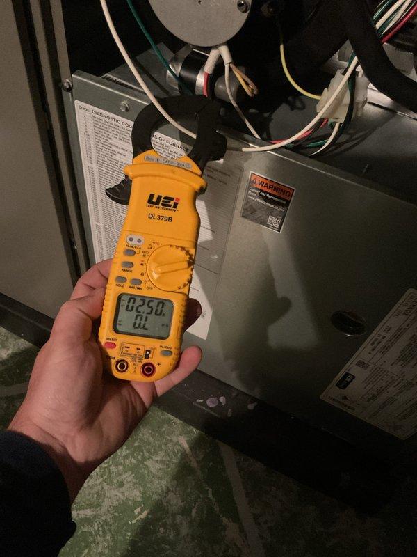 Performed complimentary preventative maintenance visit on residential cooling system. Conducted electrical diagnostics using digital clamp meter on outdoor condensing unit, verifying power factor readings and electrical performance. Inspected indoor air handler unit, checking electrical connections and control wiring integrity. All components operating within normal parameters at time of service.