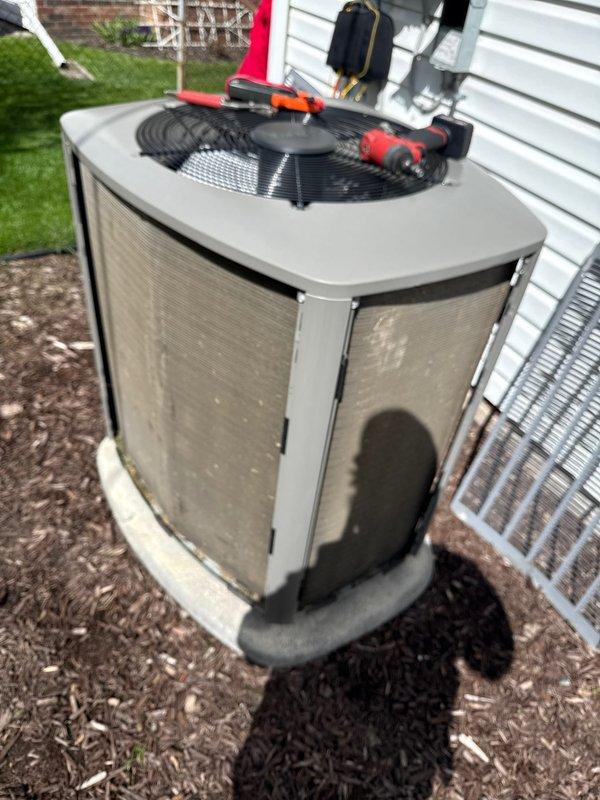 Completed annual cooling maintenance on residential air conditioning condenser unit. Performed comprehensive system inspection including visual examination of cabinet condition, electrical connections, refrigerant lines, and condensate drainage. Cleaned condenser coils, checked fan motor operation, verified proper airflow through unit, and tested system startup and shutdown cycles. Unit operating within normal parameters with no deficiencies noted at time of service.