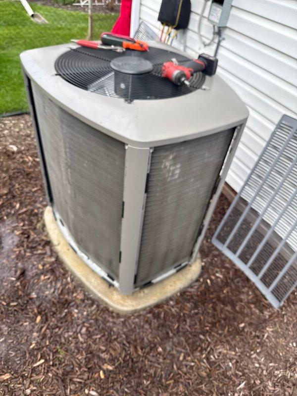 Completed annual cooling maintenance on residential air conditioning condenser unit. Performed comprehensive system inspection including visual examination of cabinet condition, electrical connections, refrigerant lines, and condensate drainage. Cleaned condenser coils, checked fan motor operation, verified proper airflow through unit, and tested system startup and shutdown cycles. Unit operating within normal parameters with no deficiencies noted at time of service.