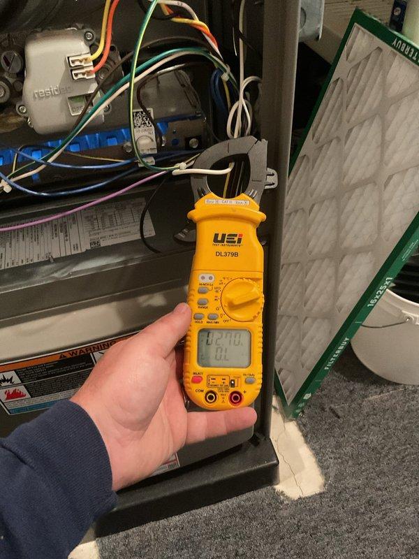 Completed comprehensive 5-year ComfortGuard maintenance visit on residential HVAC furnace system. Performed thorough inspection of all major components including blower motor assembly, capacitor, control board, and electrical connections. Conducted electrical diagnostics using digital multimeter to verify proper voltage and amperage readings across system components. Inspected air filter condition and verified proper airflow. All wiring harnesses, connections, and safety controls found to be in good working order with no issues identified.
