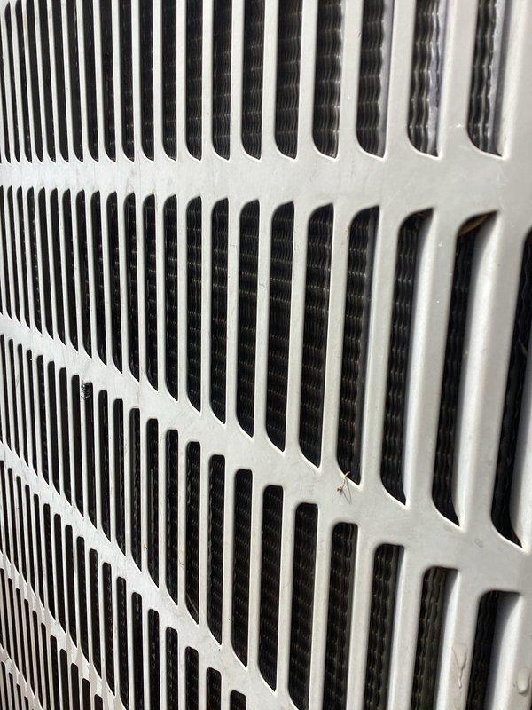 Completed annual cooling maintenance on air conditioning system. Performed system diagnostics with refrigerant manifold gauge set, recording operating pressures of 65.2 PSIG on low side and 257.2 PSIG on high side with superheat and subcooling measurements within acceptable parameters. Inspected air return grille and ventilation components for proper airflow and structural integrity.