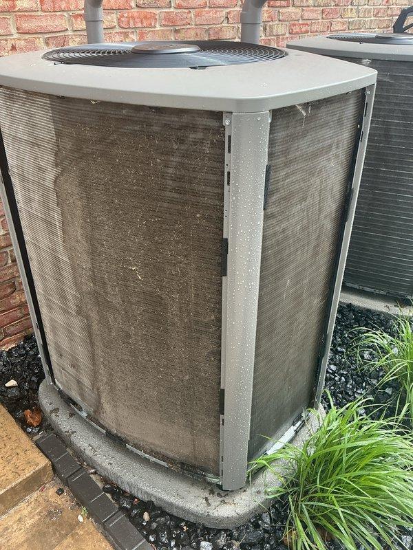 Completed annual cooling maintenance on two outdoor condensing units located against the building exterior. Performed comprehensive system inspection, replaced air filters and evaporative cooler pads on both units, and documented equipment condition with photographs. Both systems operational upon completion.