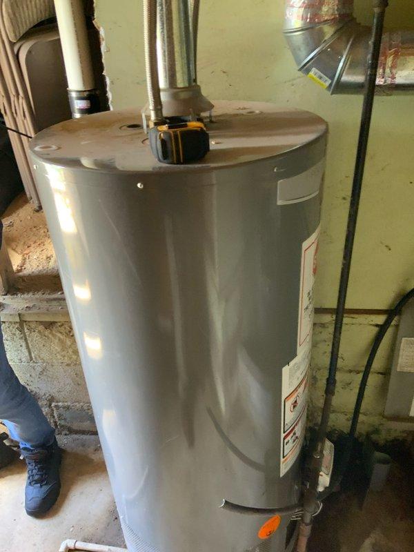 Provided estimate for complete HVAC system replacement including natural gas furnace and air conditioning unit for 20+ year old equipment located in crawl space. Assessed existing return air configuration requiring rework to access crawl space installation area. Evaluated outdoor condensing unit on concrete pad and inspected water heater and ductwork in utility space to determine proper system sizing and installation requirements.