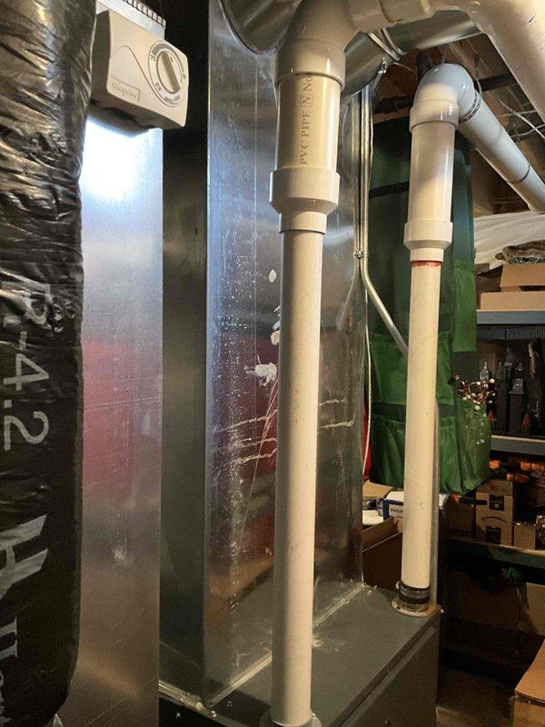 Completed full system estimate for 15-year-old furnace and air conditioning system. Inspected existing air handler unit, ductwork, electrical panel, and condensate drainage system in basement mechanical room. Documented current equipment condition and provided replacement options for complete HVAC system upgrade.