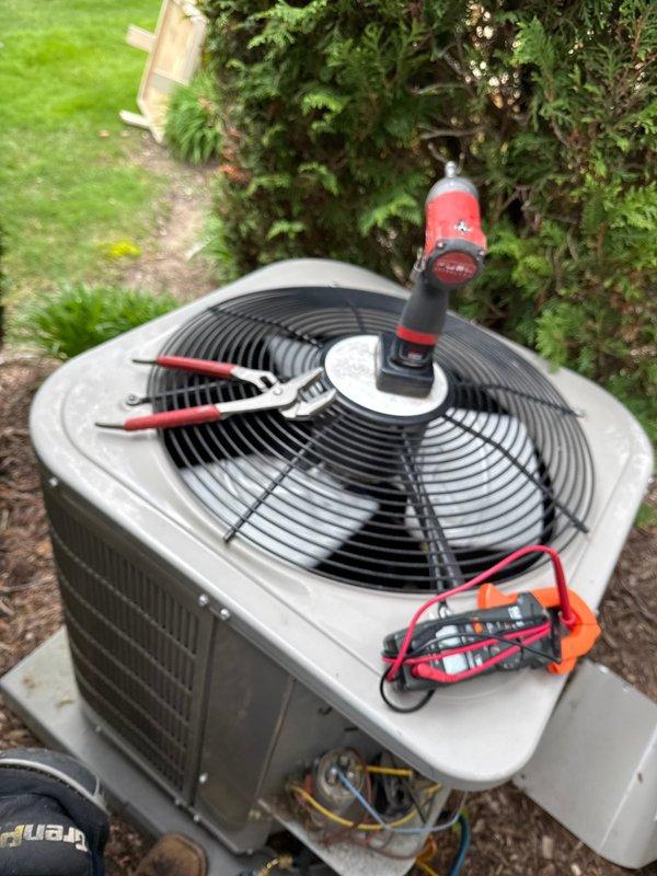 Completed annual cooling maintenance on Bryant residential air conditioning system. Performed comprehensive system diagnostics using electrical testing equipment to verify proper operation of condenser unit, checked refrigerant levels and electrical connections, inspected fan motor and compressor functionality, and replaced air filter and evaporative cooling pad as needed. All components tested within normal operating parameters and unit is ready for cooling season.