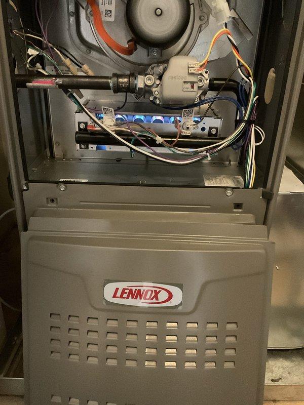 Completed full HVAC system installation including a Lennox 70,000 BTU furnace and 2-ton air conditioning unit with rear discharge configuration. Installed new furnace with gas valve assembly, draft inducer motor, and all necessary electrical connections and wiring. Fabricated and installed metal ductwork with proper joints and elbows to route airflow throughout the system. Connected flexible gas line to furnace, verified all mechanical and electrical components operational, and ensured proper venting and combustion air supply. System tested and confirmed operational upon completion.