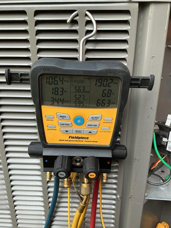 # HVAC Maintenance - ACM Completed

Performed routine Air Care Maintenance on residential air conditioning system. Conducted comprehensive system diagnostics using refrigerant manifold gauges to verify proper refrigerant pressures and temperatures on both low and high sides of the system. Inspected outdoor condenser unit for proper operation, verified fan motor function, and checked electrical connections and wiring at both indoor and outdoor components. All system parameters measured within manufacturer specifications. Unit operating efficiently with no deficiencies noted.