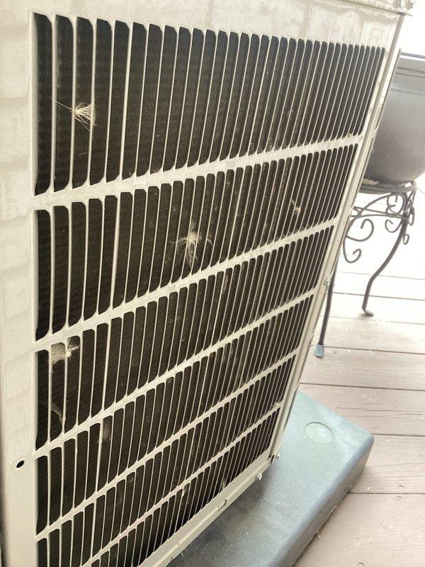 Completed annual cooling maintenance on two residential air conditioning systems. Performed comprehensive inspection of both outdoor condenser units, including visual assessment of cabinet condition, coil cleanliness, and overall system integrity. Changed furnace filter to ensure proper airflow and system efficiency. Both condensers showed normal aging and environmental debris accumulation but remained operational. Documented equipment condition with photographs for service records.