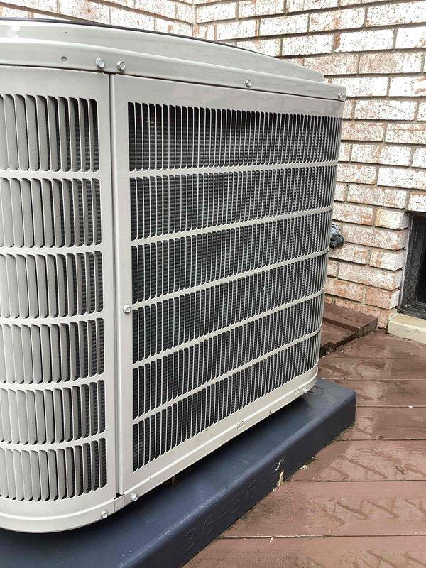 Completed annual cooling maintenance on two residential air conditioning systems. Performed comprehensive inspection of both outdoor condenser units, including visual assessment of cabinet condition, coil cleanliness, and overall system integrity. Changed furnace filter to ensure proper airflow and system efficiency. Both condensers showed normal aging and environmental debris accumulation but remained operational. Documented equipment condition with photographs for service records.