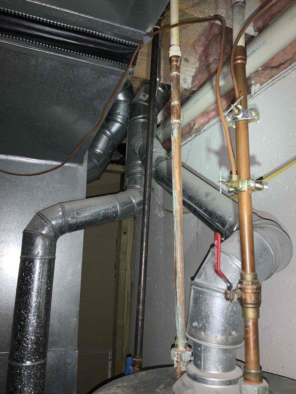 Provided estimate for replacement of existing Carrier furnace and air conditioning system located in basement utility area. Current furnace operational but aging air conditioning unit experiencing performance issues. Assessed existing HVAC infrastructure including ductwork, condensate drainage system, and associated mechanical components to determine replacement requirements and compatibility with new equipment installation.