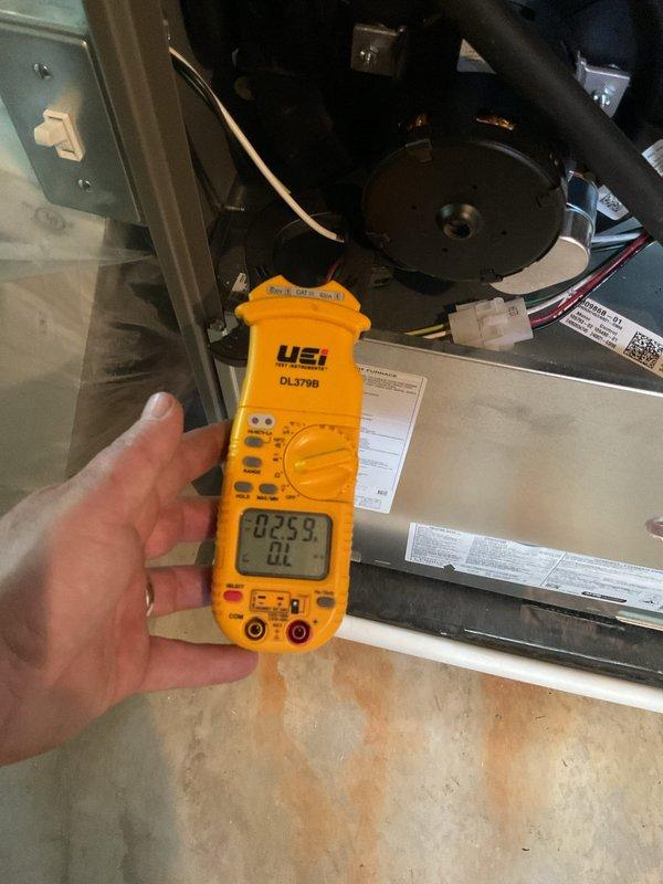 Completed annual heating maintenance and tune-up on furnace system per membership agreement. Performed comprehensive system diagnostics using digital multimeter to verify electrical components, tested capacitor functionality, and inspected blower motor assembly. All components operating within normal parameters; replaced air filter and humidifier pad as part of routine maintenance.
