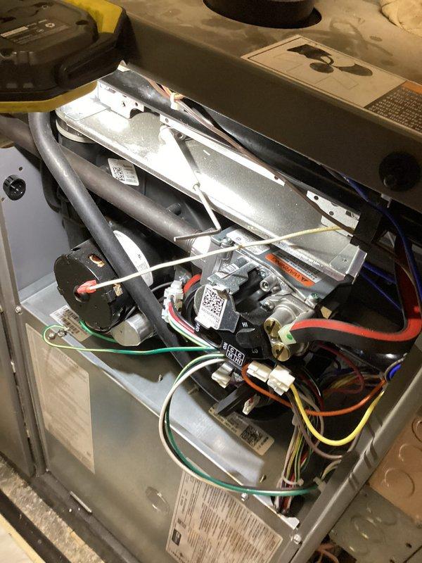 Completed annual heating maintenance and tune-up on furnace as part of membership agreement. Performed comprehensive inspection of all internal components including blower motor assembly, heat exchanger, burner assembly, electrical connections, and control systems. Verified proper operation of all mechanical and electrical components, checked wiring harnesses and safety controls, and documented unit condition with photographic records. All systems operating within normal parameters with no issues identified.