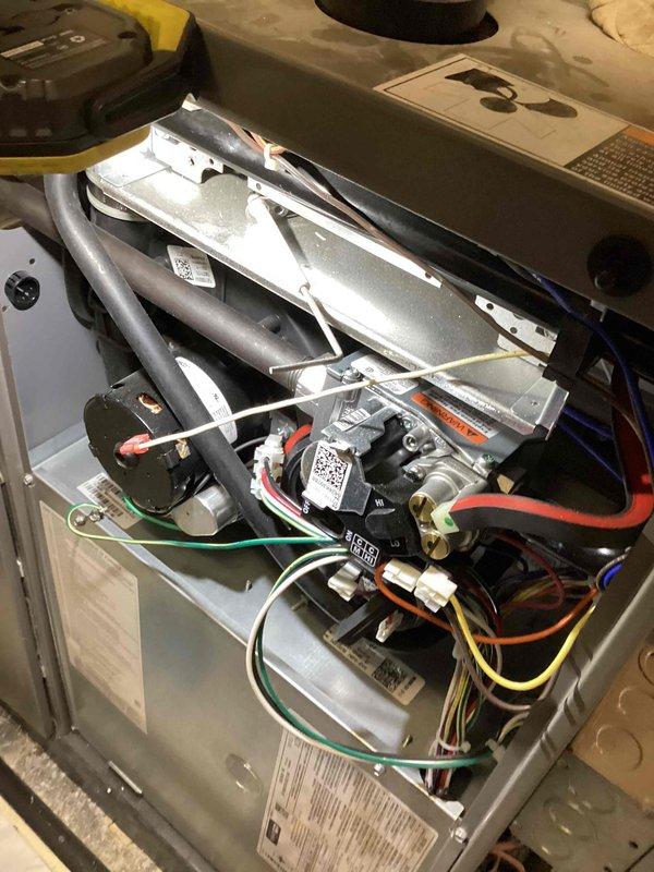 Completed annual heating maintenance and tune-up on furnace as part of membership agreement. Performed comprehensive inspection of all internal components including blower motor assembly, heat exchanger, burner assembly, electrical connections, and control systems. Verified proper operation of all mechanical and electrical components, checked wiring harnesses and safety controls, and documented unit condition with photographic records. All systems operating within normal parameters with no issues identified.