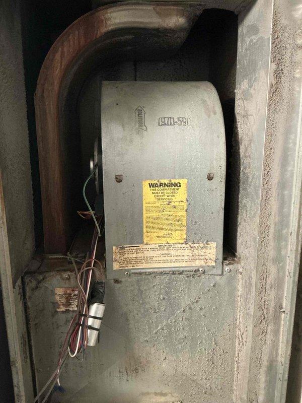 Provided estimate for complete HVAC system replacement at residential property with non-functional 1992 furnace located in front section of home. Assessed existing aged heating unit showing significant wear, deterioration, and operational failure, with no air conditioning system currently installed. Documented equipment condition and installation location to prepare comprehensive replacement proposal for new furnace and air conditioning system.