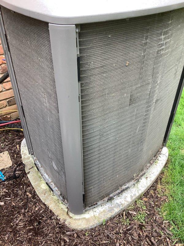 Completed annual cooling maintenance on outdoor condenser unit. Performed standard ACM protocol including inspection of condenser coils, which showed significant dirt and debris accumulation with visible streaking and discoloration across heat exchanger fins. Unit operational at time of service with all components functioning within normal parameters.