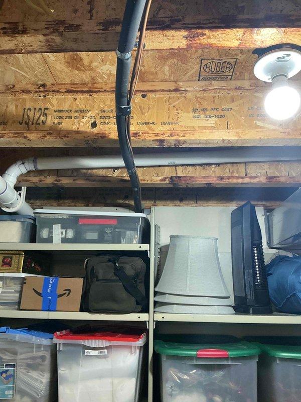 Conducted comprehensive assessment of 20+ year old natural gas furnace and air conditioning system located in basement mechanical room. Evaluated existing equipment condition, documented current installation configuration including ductwork connections and ventilation system, and provided detailed replacement estimate for both heating and cooling units. Current system operational at time of inspection.