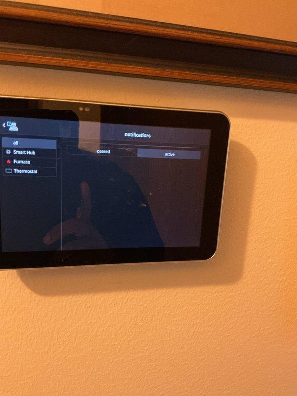 Completed annual cooling maintenance on Lennox HVAC system. Verified thermostat operation and programming, confirmed system status showing heat mode set to 72° with outdoor temperature at 44°. Inspected smart home hub integration and confirmed proper communication between thermostat and control panel, with all system components responding appropriately.