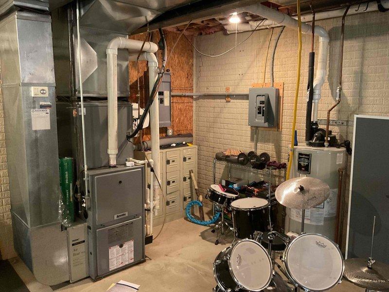Conducted comprehensive evaluation of 16-year-old residential air conditioning system with history of refrigerant leak from previous season. Performed thorough inspection of outdoor condensing unit, indoor furnace, and existing ductwork distribution system to assess equipment condition, proper sizing requirements, and identify causes of uneven temperature distribution throughout living spaces. Evaluated ductwork layout and airflow patterns to address reported hot and cold room issues, documenting current system configuration and recommending necessary modifications for improved comfort and efficiency.