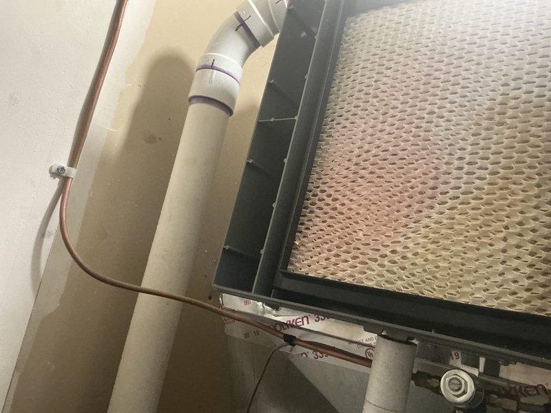 Completed routine air conditioning maintenance on a 5-year-old system. Performed comprehensive AC tune-up including inspection of air handler unit, verified proper operation of all components, and examined filter condition. Checked condensate drain line for proper flow and documented equipment condition through photographs. System found to be operating within normal parameters with no issues identified during the maintenance visit.