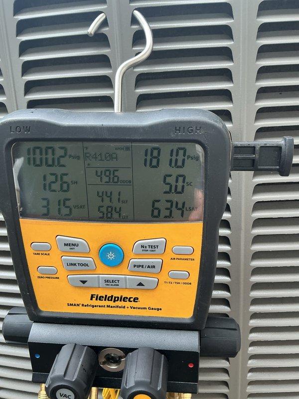 Completed annual preventative maintenance on residential air conditioning system. Performed comprehensive system diagnostics using refrigerant manifold gauges, verifying proper operating pressures and temperatures across the system. Inspected outdoor condenser unit, confirmed proper airflow through coils, and documented equipment condition with unit operating within normal parameters.