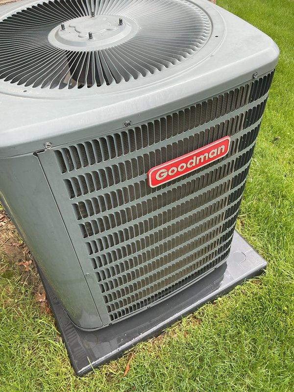Completed scheduled maintenance on Goodman brand outdoor condensing unit. Performed standard ACM protocol including inspection of condenser coils, fan motor operation, refrigerant lines, and electrical connections. Unit found in good working condition with clean coils, proper airflow through louvered intake grilles, and no visible signs of wear, damage, or refrigerant leaks. Verified secure mounting on concrete pad and confirmed all components operating within normal parameters.