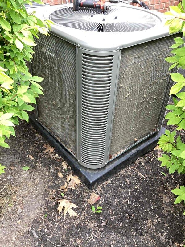 Completed annual cooling maintenance on residential air conditioning system. Performed filter replacement and changed thermostat batteries. Inspected outdoor condenser unit, which showed normal wear and weathering from outdoor exposure with visible dirt accumulation and organic growth on exterior surfaces. Unit operational and running as designed. All routine maintenance items addressed per scheduled service agreement.