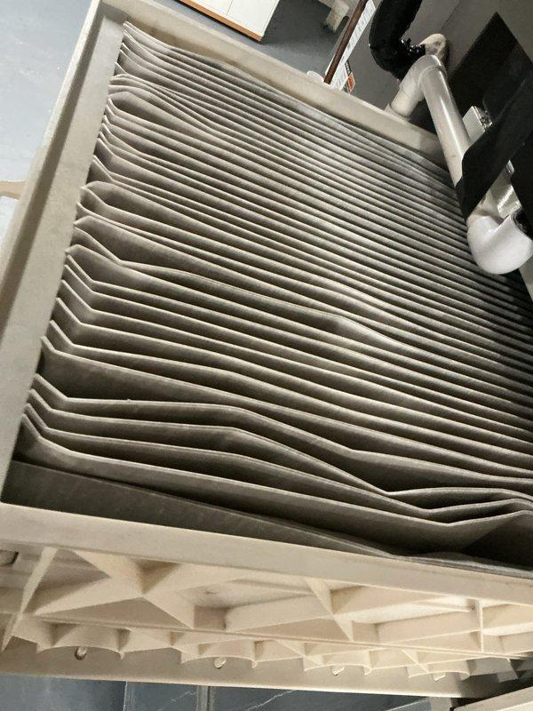 Completed annual cooling maintenance on residential HVAC system. Inspected thermostat operation and verified proper temperature control functionality. Examined air filter condition, noting visible dust accumulation on pleated filter media. Performed standard ACM protocol including system inspection and operational checks to ensure equipment readiness for cooling season.